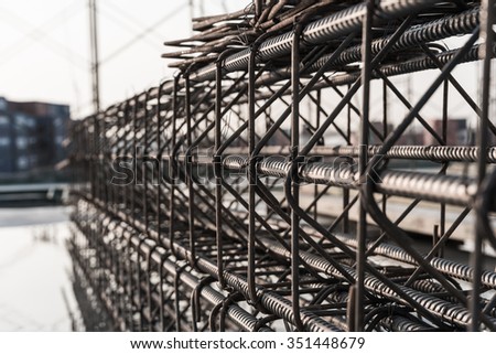 Reinforcement of concrete work. Using steel wire for securing steel bars with wire rod for reinforcement of concrete or cement. focus to steel wire