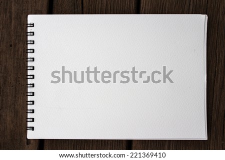 Blank white pond paper realistic spiral notepad notebook on wood background