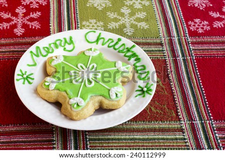 Christmas Snowflakes cookie on white plate with 