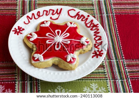 Christmas Snowflakes cookie on white plate with \