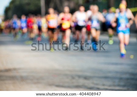runners in marathon, abstract blurry
