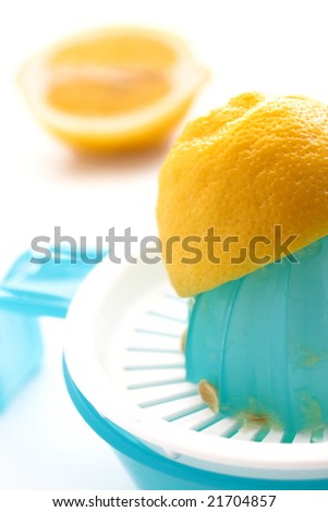 sliced lime lemon on a squeezer.
