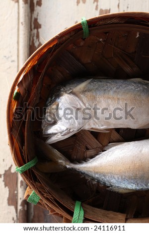 two mackerel fish in bamboo basket, fish from Pacific ocean.
