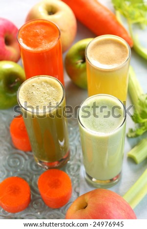 mixed detox fruit and vegetable juice. There are celery, carrot, apple, pineapple.