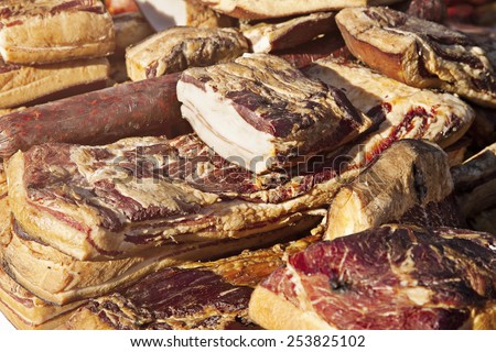 Ham, sausage and bacon at market