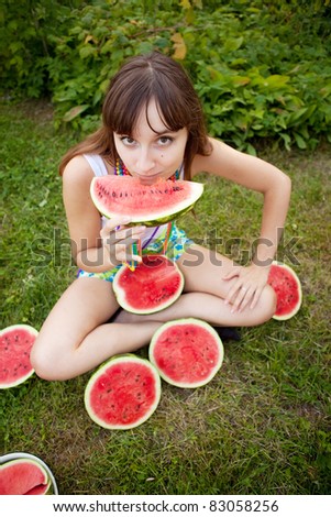 bright picture of lovely  woman with watermelon