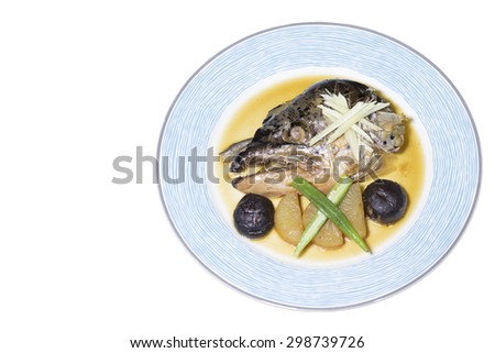 Salmon head cooked stew with sweet sauce on white background,japanese food