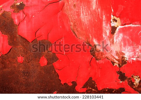Background texture pattern of red painted grungy steel of car close-up