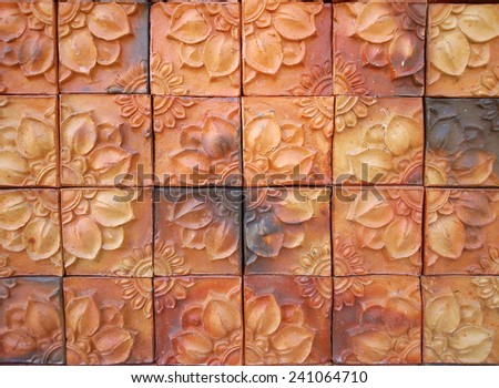 brown brick tile background, flower textured brick