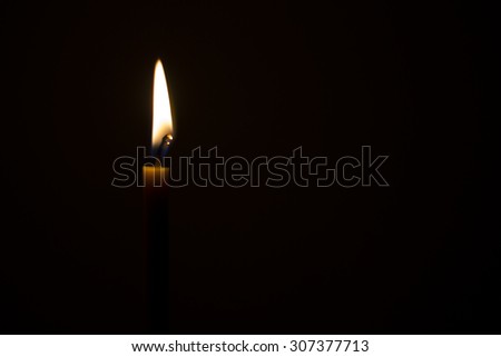 candle light in the dark, space for caption