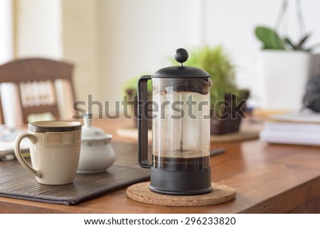 French press on the kitchen table