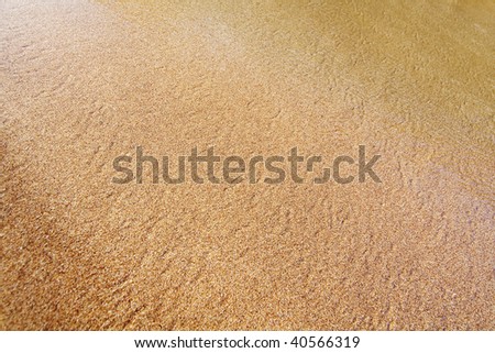 Sand background with a shadow for highlighting the central part
