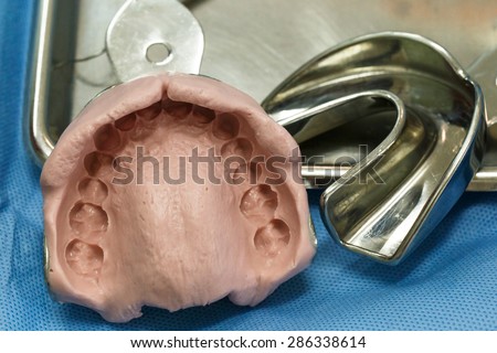 Dental impression and tooth model. Medical concept.