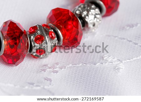 Lace and red jewelry