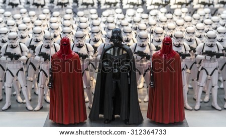 TOKYO, JAPAN - AUGUST Minature model figures of Darth Vader and storm troopers lined up in a display illustrating the merchandise related to the Starwars films shown on August 7, 2015 in Tokyo, Japan