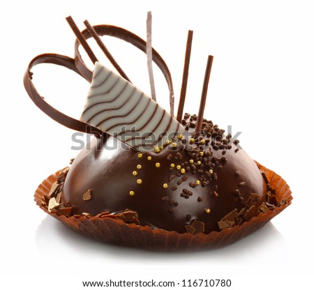 Delicious chocolate pastry with decoration isolated on white background