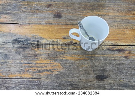 Close up cup of coffee  white cup on wooden background