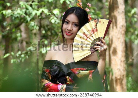 portrait Asia Beautiful Japanese kimono women and Japanese geisha women with Folding Fan and traditional fan