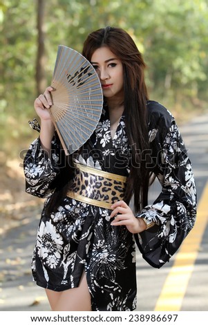 portrait Asia Beautiful Japanese kimono women and Japanese geisha women with Folding Fan and traditional fan