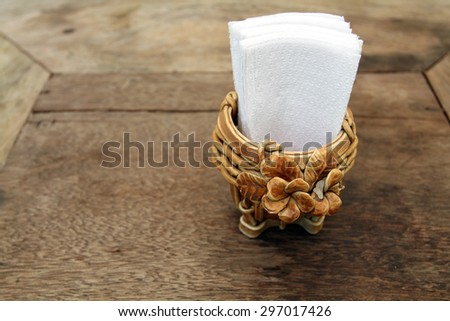 tissue paper in wood Box on table