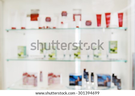 blurry medicine cabinet and store Skin protection cream and pharmacy drugstore for background