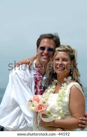 casual bride and groom in beach wedding