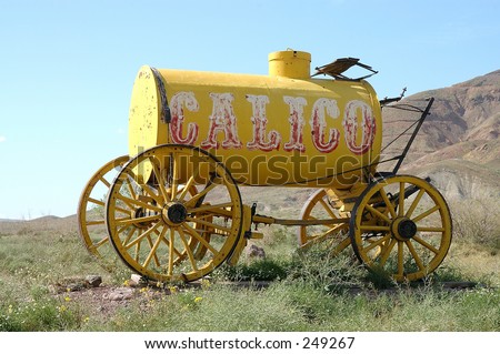Old time horse drawn water wagon marks the entrance to Calico Ghost town. An 1890\'s silver boom town in the mojave desert.