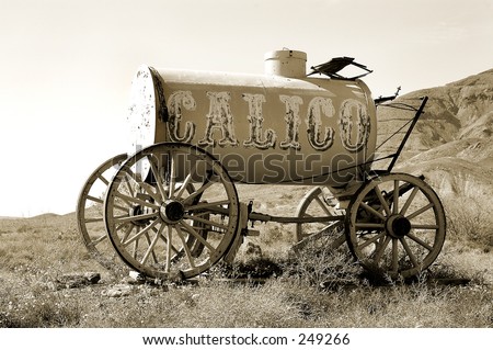 Old time horse drawn water wagon marks the entrance to Calico Ghost town. An 1890\'s silver boom town in the mojave desert.