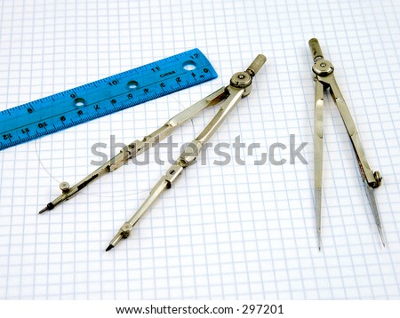 Drafting tools (circa 1930) on graph paper with a ruler