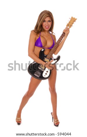 stock photo Sexy latina Rock and roll pinup with an electric guitar 