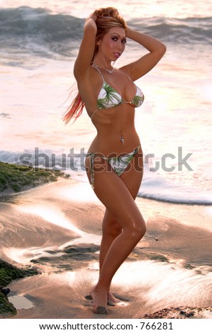 Asian bikini model on Aliso Beach at sunset. Bikini by Swimbay Los Angeles California