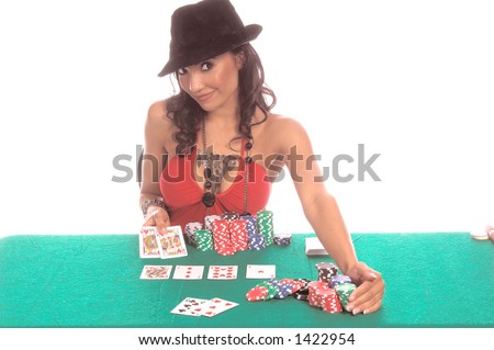 Sexy woman in a sexy low cut red blouse and  black suede fedora hat playing Texas Hold \'um poker Generic no label card backs from China