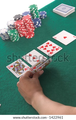 Texas Hold \'Um poker player peels back her cards to reveal a hearts Royal Flush Generic no label card backs from China