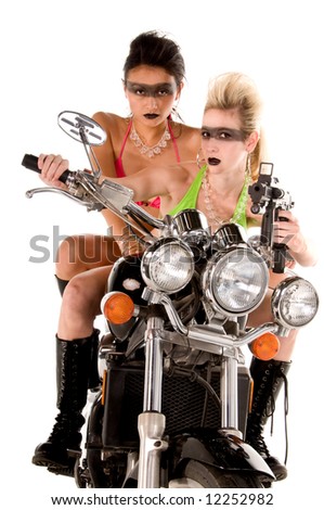 stock-photo-two-beautiful-gun-toting-young-woman-in-in-high-fashion-makeup-and-hair-in-bikinis-on-a-motorcycle-12252982.jpg