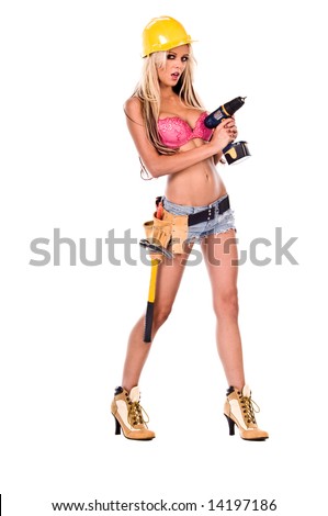 stock photo High fashion glamour model in Daisy duke shorts tool belt 