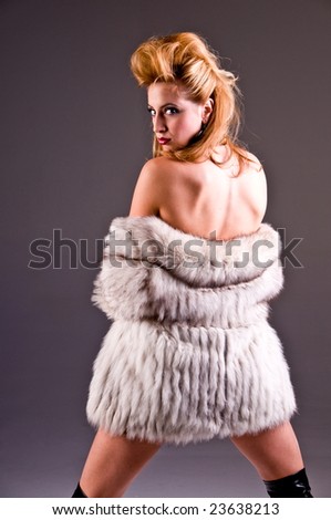 High fashion blonde model in an Autumn print dress