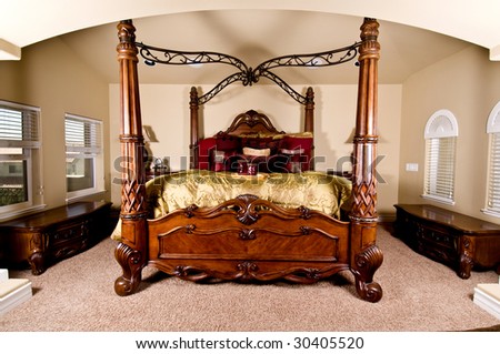 Four poster bed in a luxurious master bedroom