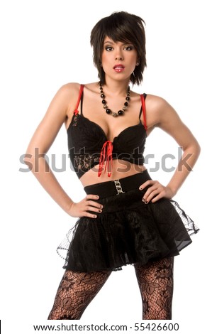 Beautiful gothic model in a black lace skirt, corset top and stockings