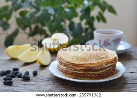 Hot pancakes with aromatic tea, breakfast