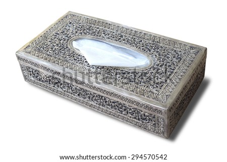 Engraved old silver tissue box isolated on white background.