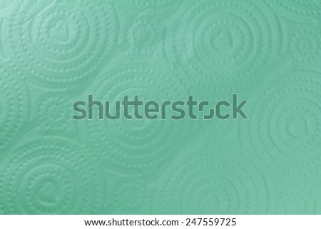 Multiple purpose towel paper is green , circle design and the heart for the background