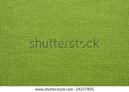 Green knitted fabric. Ideally as background