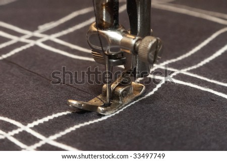 Old stitching machine stitch checked material