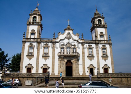 VISEU, PORTUGAL August 11, 2015: People going to the church service at church of Misericordia in the central square of Viseu near of cathedral.