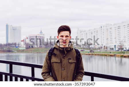 Young man in the city Minsk in autumn time