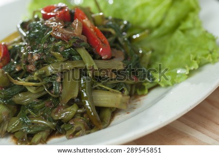 Quick fried water spinach with chili and soy sauce.