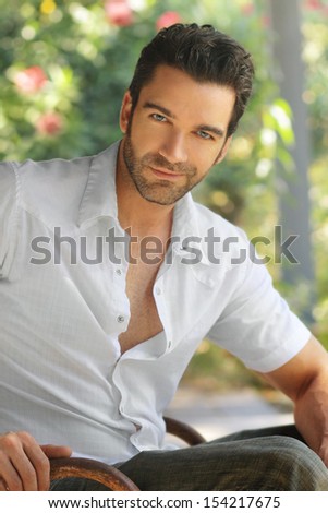 Sexy Handsome Man Outdoors With Playful Smile