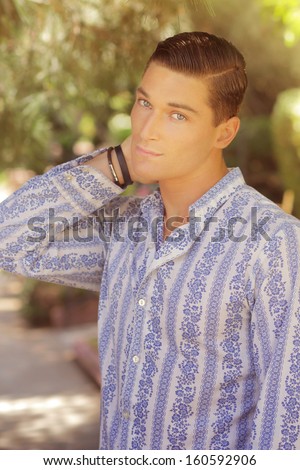 Outdoor portrait of a handsome young male model