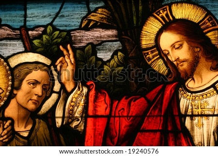 Stained glass showing Jesus blessing a man