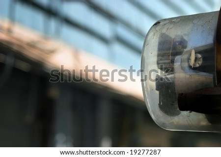 Artful shot of an electric meter against urban setting